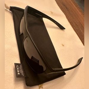 Oakley black TwoFace with prizm black lenses. A little scratch on the left lens